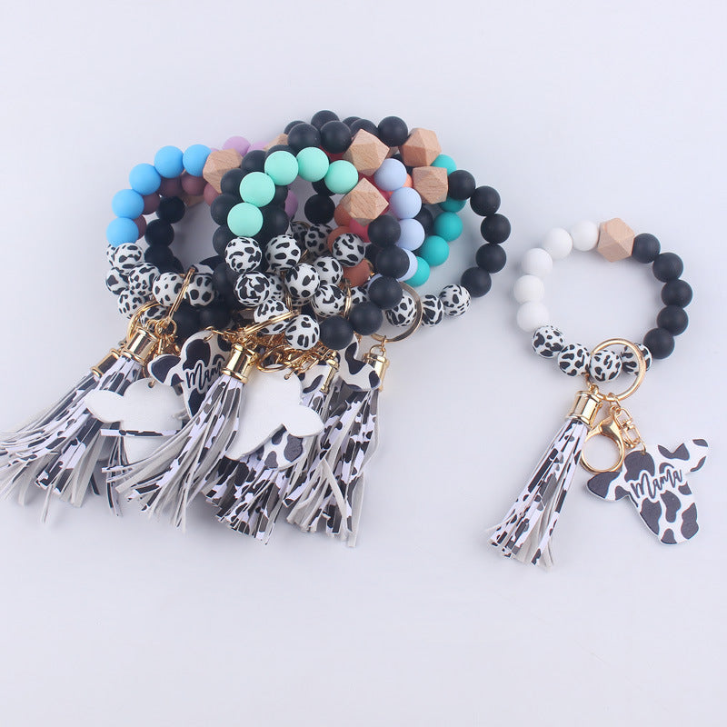 Wholesale MAMA Wood Chips Cow Head Western Style Silicone Beads Wrist Keychain